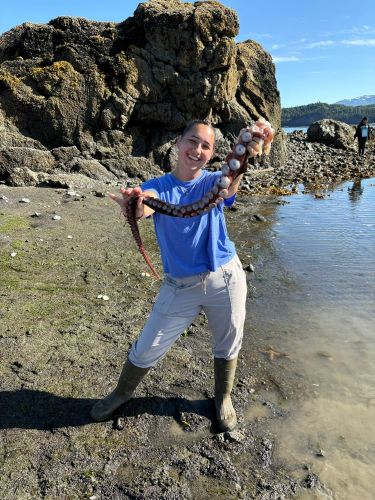 Student holding a tentacle