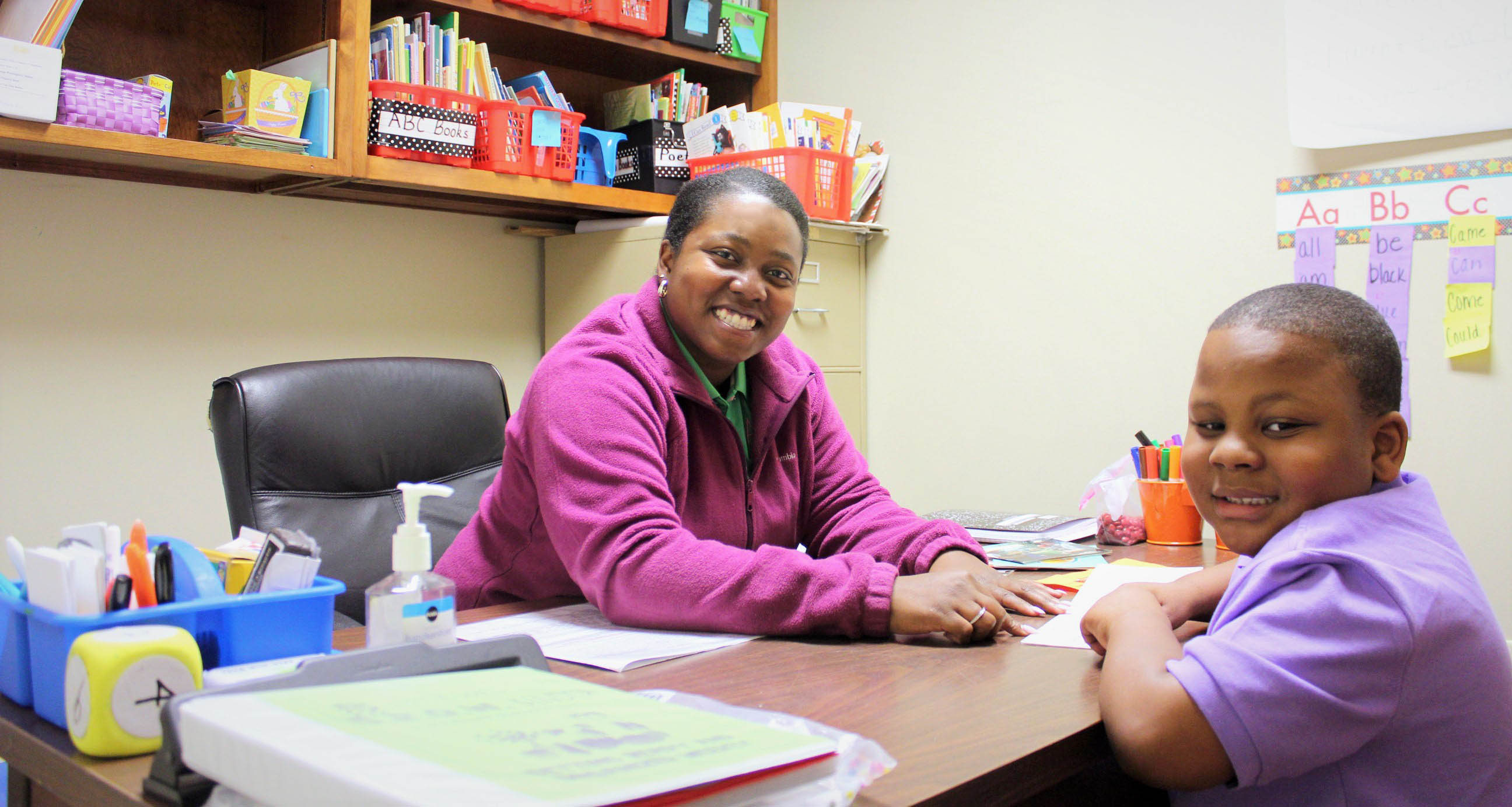 Angie Brown, a student in the USA College of Education and Professional Studies, working with Jackson Tucker, a kindergarten student, at the USA Literacy Center. data-lightbox='featured'