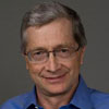 John E. Oakes, PhD