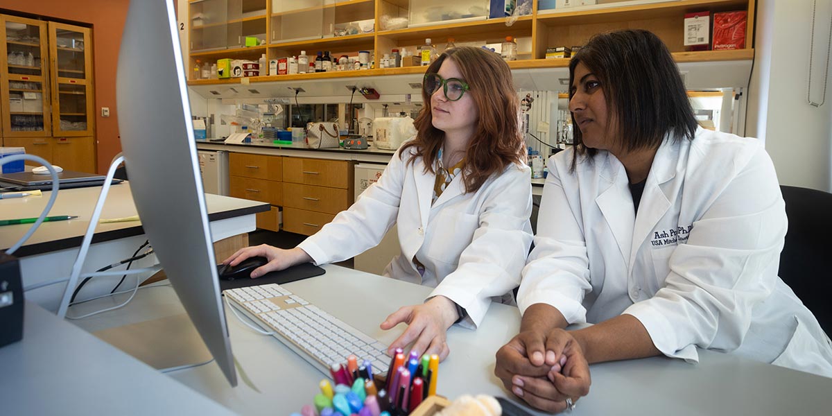 Dr. Ash Prakash and graduate student Megan Patterson