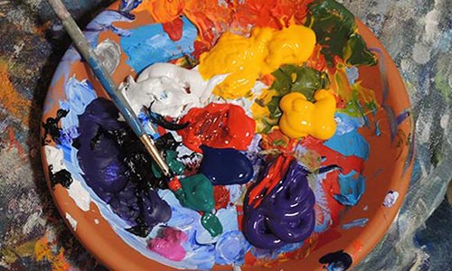 Paint brushes and paint.