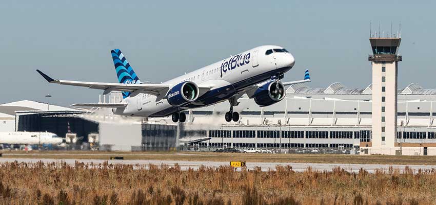 Jetblue plane taking off from the runway. data-lightbox='featured'