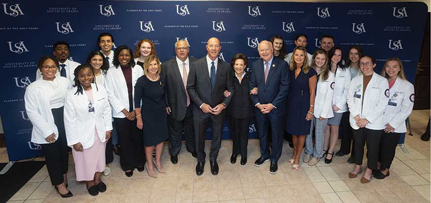 Elliot B. Maisel, President Bonner, Vice President Kent, and medical staff. data-lightbox='featured'