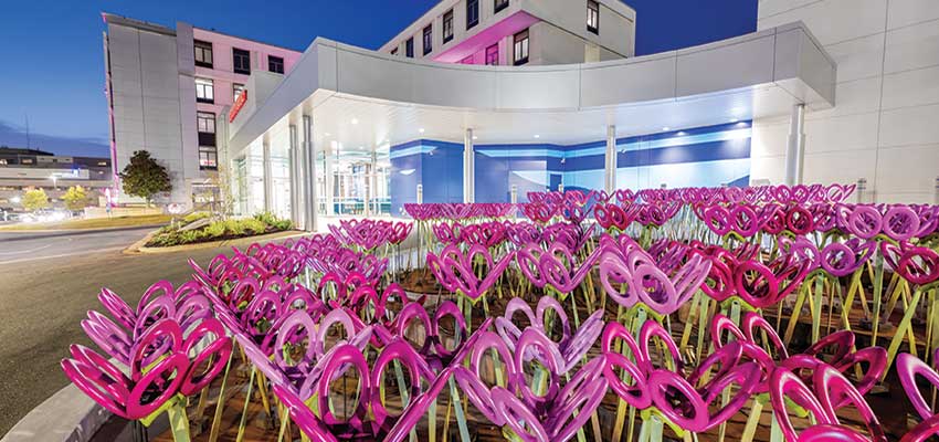 Flower sculpture in front of USA Health Children’s & Women’s Hospital. data-lightbox='featured'