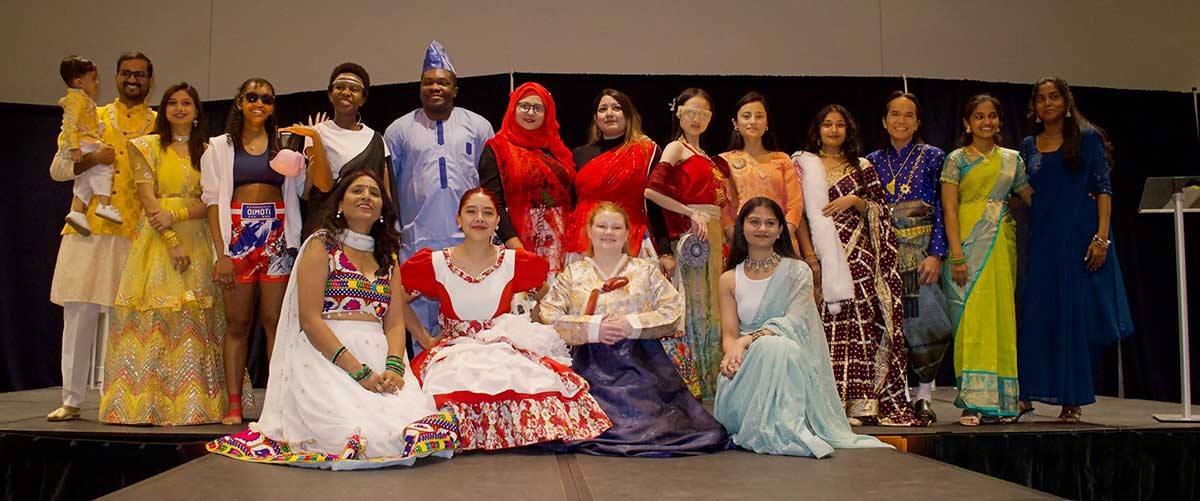 Group of International students in clothing from different countries.