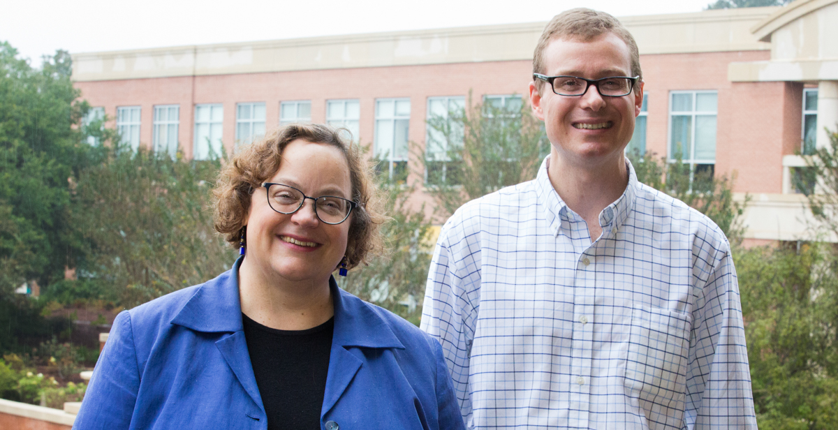 Dr. Laura Moore, left, associate professor and chair of music, and Dr. Silas Leavesley, professor of chemical and biomolecular engineering, were named respectively as Phi Kappa Phi’s artist and scholar of the year. data-lightbox='featured'