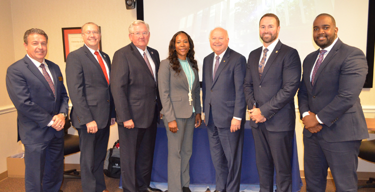 The University of South Alabama is expanding its Pathway USA program, opening more doors to opportunity for community colleges students to earn a four-year degree. Pictures from left, Todd Shackett, Southern Union State Community College president, Brad Frick, Trenholm State Community College executive vice president, Craig Pouncey, Coastal Alabama Community College president, Coretta Boykin, Reid State Technical College president, Jo Bonner, University of South Alabama president, Brock Kelley, Lurleen B. Wallace Community College president and Olivier Charles, Bishop State Community College president. data-lightbox='featured'