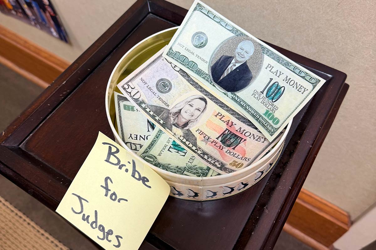 Bribes for Judges with fake money with President Bonner and Dr. Kent on them. Bribes for Judges with fake money with President Bonner and Dr. Kent on them.